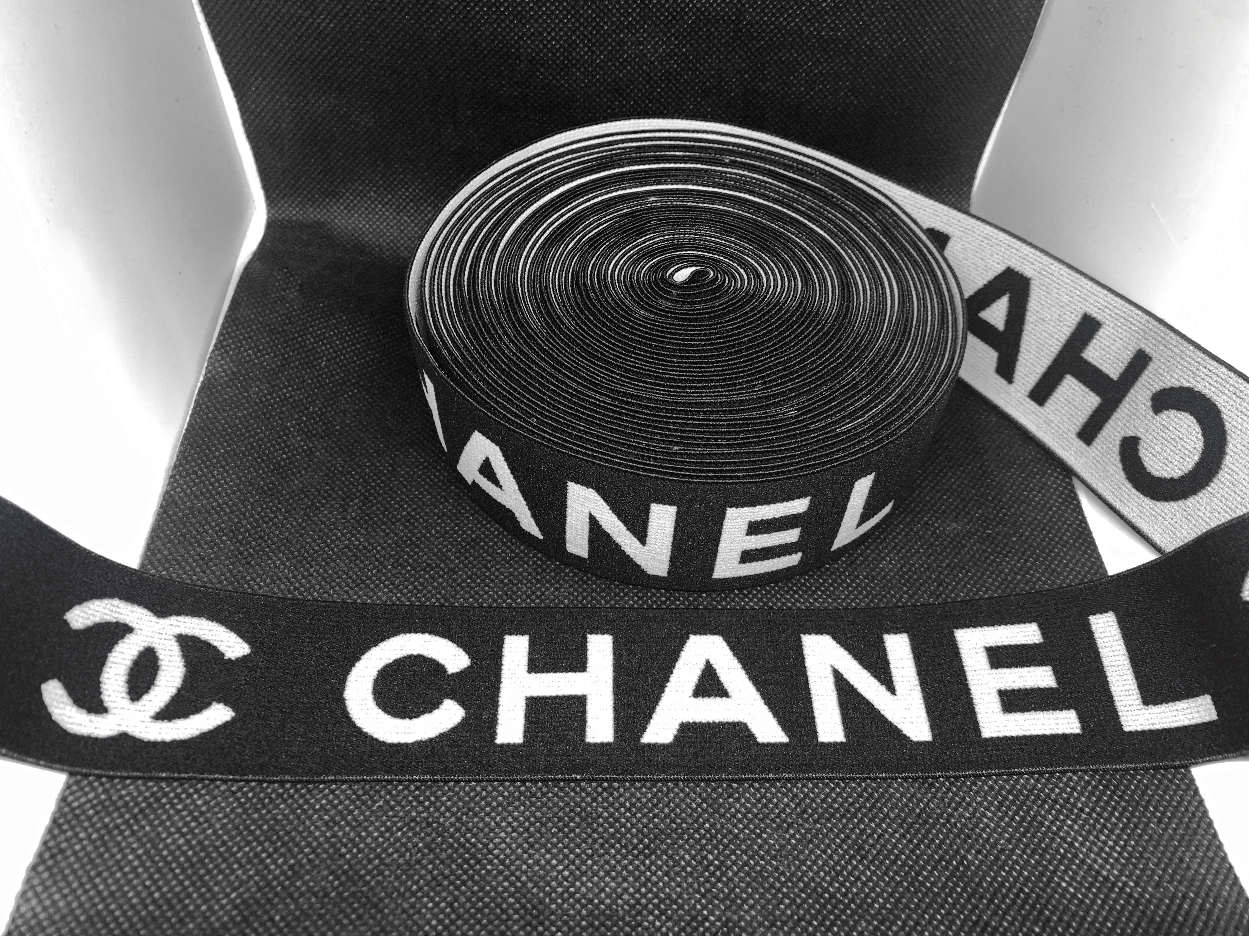 chanel ribbon logo black and white